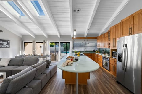 Bright, airy, and beautifully designed — this living area flows effortlessly into the dining and kitchen spaces for easy entertaining.