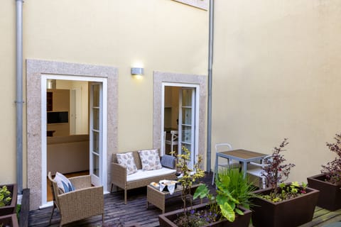 The charming private patio is located in the middle of the refurbished building.