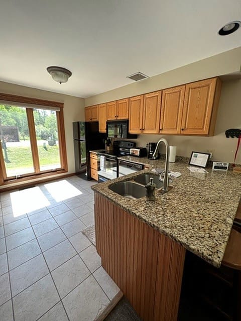 Open Kitchen with everything you'll need to enjoy meals together.