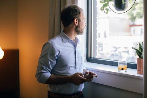 The best way to get ready for a night out is with a neat glass of bourbon