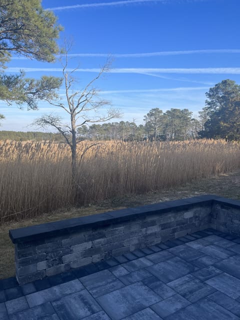 Brand new stone wrap around patio accentuating the gorgeous view.