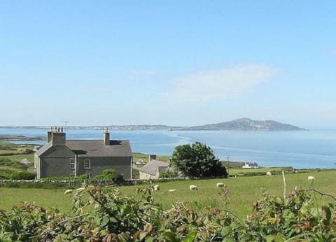 Pen y Graig farmhouse with views looking out over Church bay towards Holyhead 