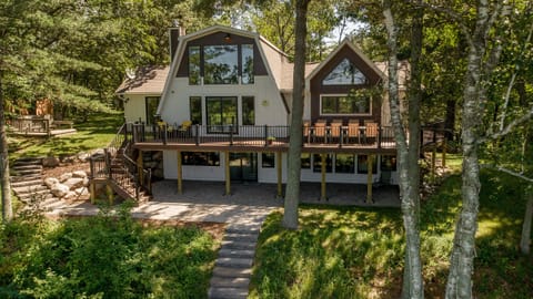 View from the beach side of property. Wraparound deck and lower patio.