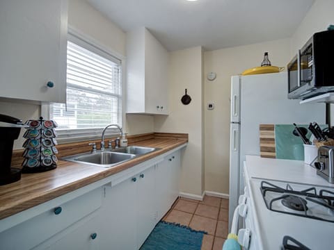 Kitchen with Keurig and all amenities needed for a kitchen to cook.