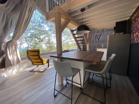 The kitchen island and small full kitchen offer all the amenities for your meals with a view!