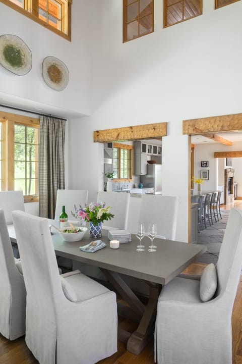 Dining table looking into kitchen