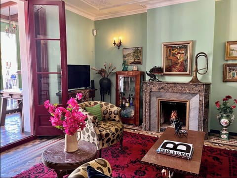 Living room with view of gallery / exterior.