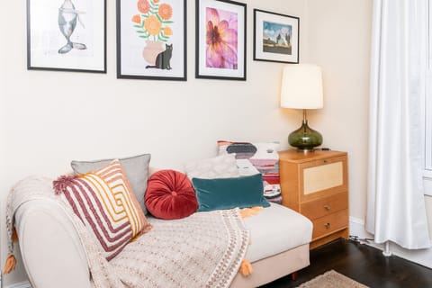 Entry foyer, chaise longue also fold down into a bed and liens are beneath  