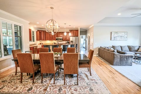 Open floor plan view of Dining room, kitchen and living room