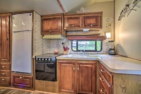 Kitchen | Main Level | Dishwasher | Crockpot | Dishware + Flatware
