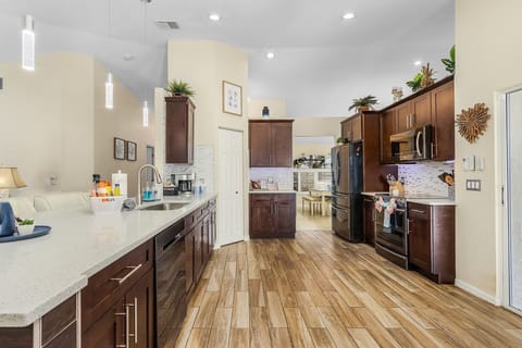 Well-stocked kitchen, coffee bar, and complimentary waffles await your arrival.