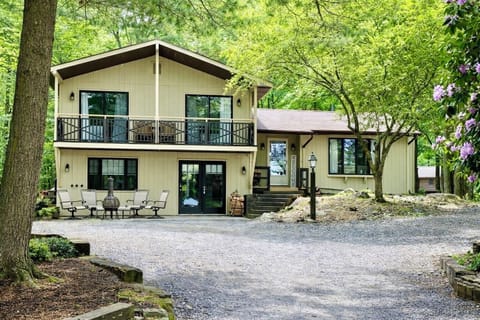 4 BR, 2 1/2 bath with 2 living spaces, balcony, deck, firepit, and much more