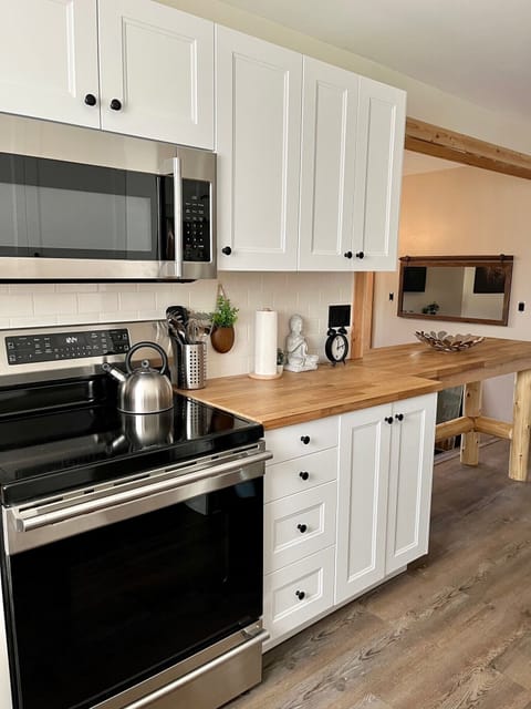 New Range, Microwave, and Butcher Block style Counters