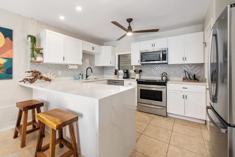 Kitchen with bar stools