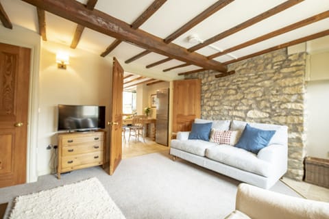 Ground floor: Sitting room leading to the dining kitchen