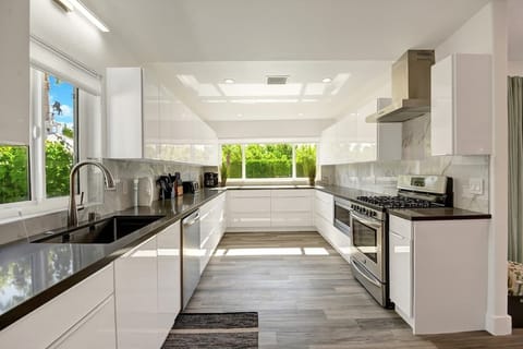 Spacious and sleek kitchen.