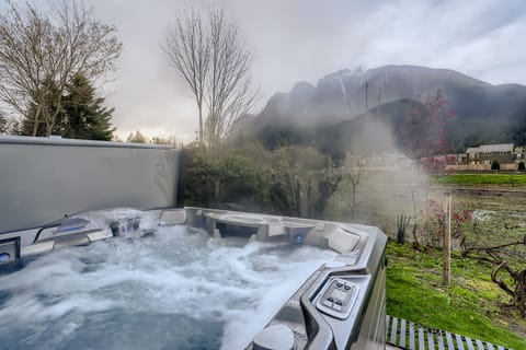 Sizeable hot tub to relax and take in the commanding mountain views.