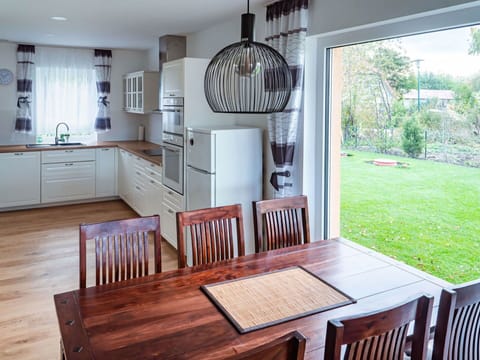 Furniture, Property, Table, Window, Cabinetry, Plant, Wood, Chair, Countertop, Lighting