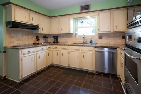 All the dishes, pots, pans, utensils you could ask for cooking and eating.