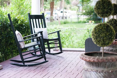 Enjoy this front porch and let the busy world pass by