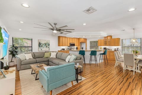 Room for everyone in this open concept kitchen/dining/living room