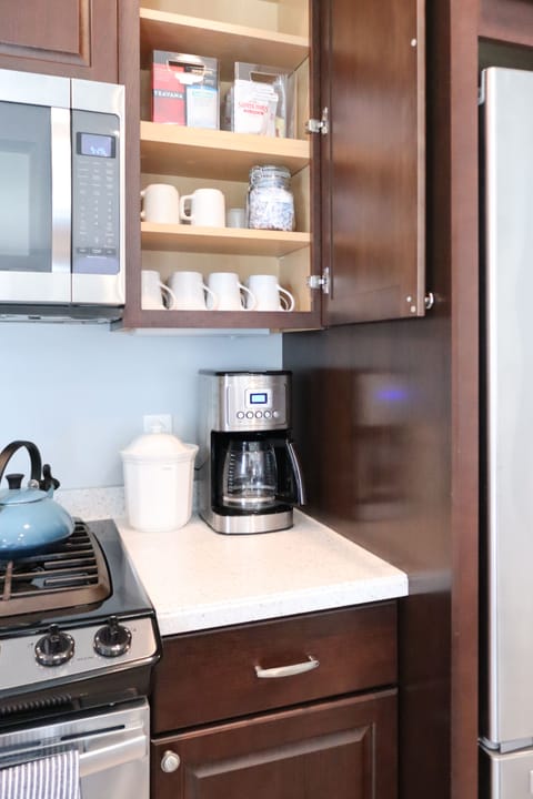 Our beverage station is stocked with coffee, hot cocoa, tea, cream, and sugar 