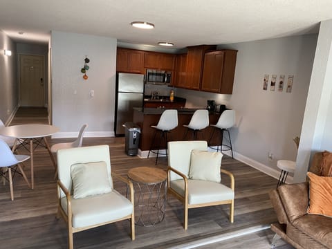 Main living area with chairs over looking the lake.