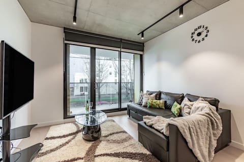Features a modern TV that provides you with the perfect opportunity to indulge in your favorite shows and movies during a binge-watching session or simply enjoy quality time with friends and family.
