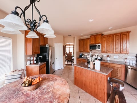 Cook your favorite meal in this fully stocked spacious kitchen