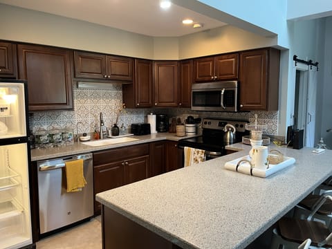 Kitchen w/brand new refrigerator