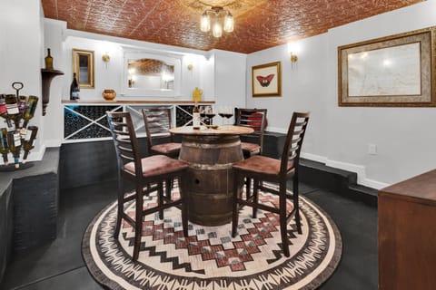 Unwind in our newly-added wine cellar lounge, a hidden gem tucked below the main house.