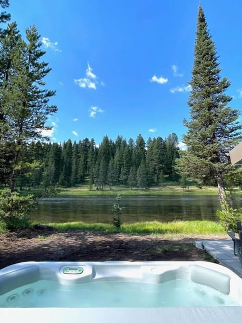 Relax under the stars at the Rivers Edge in the hot tub!