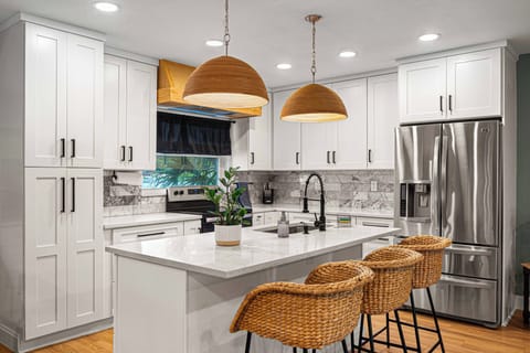 Gather at the kitchen island—sip coffee, share snacks & chat with the chef