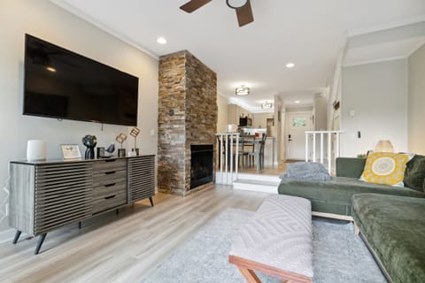 Enjoy the cozy living room with a gas fireplace and a Roku TV