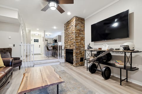 Enjoy the cozy living room with a gas fireplace and a Roku TV