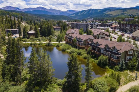 - Aerial view of lakefront homes with mountain backdrop   - Scenic location with water, trees, and alpine views   - Perfect mountain retreat close to outdoor adventure