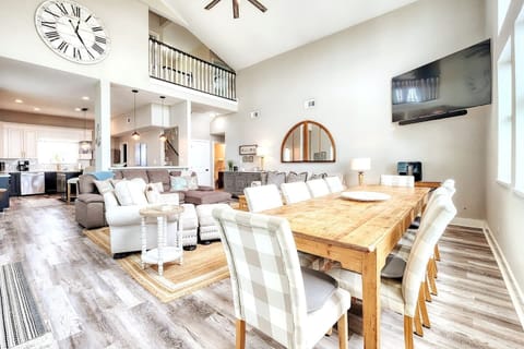 Gather everyone at the expansive table with additional counter seating.