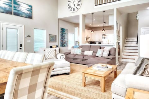 Plenty of seating options for the whole group to spread out. Stairs to 3 bedrooms, 2 bathrooms and the upper balcony.