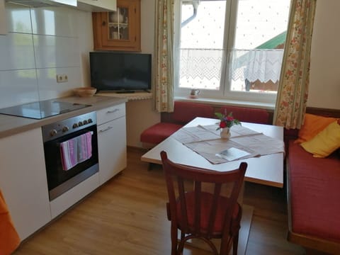 Property, Window, Furniture, Cabinetry, Countertop, Table, Kitchen Appliance, Kitchen Stove, Wood, Stove