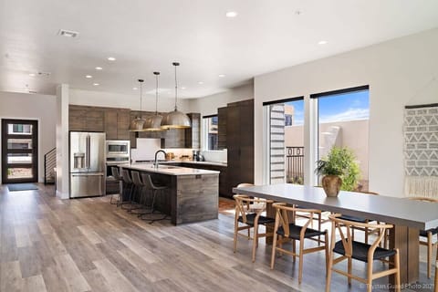 Dining Area bar seating and large dining table