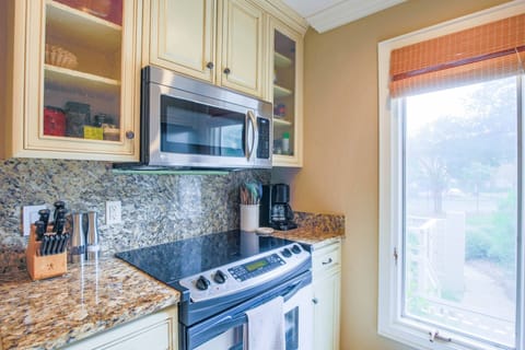 The well stocked kitchen also has a drip coffee maker.