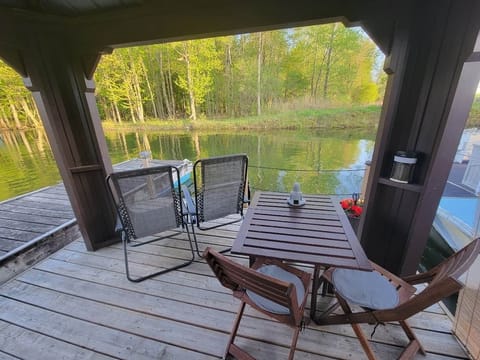 Private floating terrace furnished for dining and relaxation