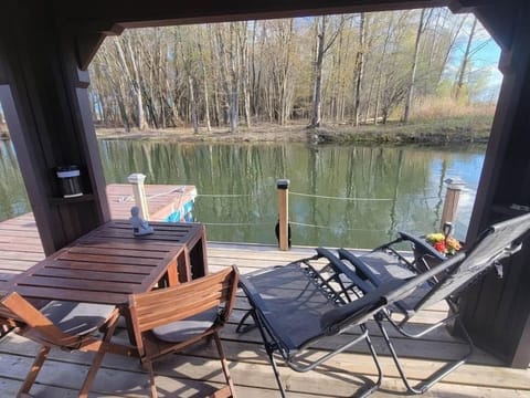 Large floating terrace furnished for meals and relaxation