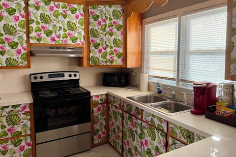 Kitchen with a tropical jungle funky folly vibe.