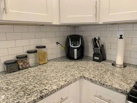 The kitchen includes an air fryer.