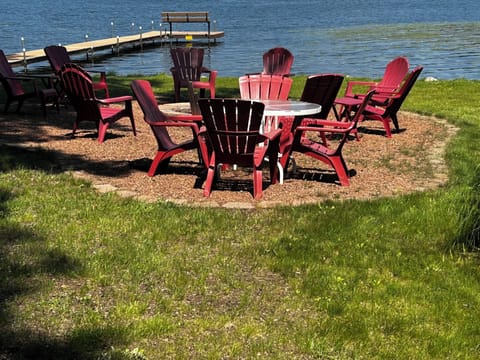 Fire Pit area with 12 Chairs and Table.
