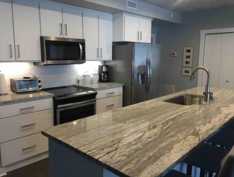 Kitchen is well stocked with the basics.