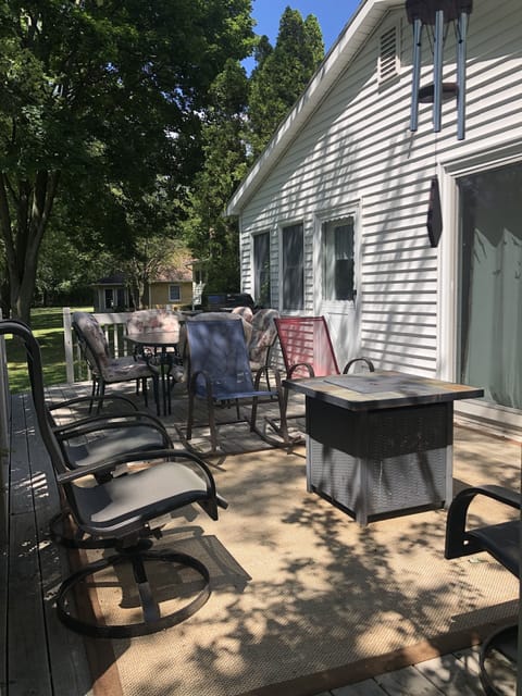 Rear deck with fire pit.