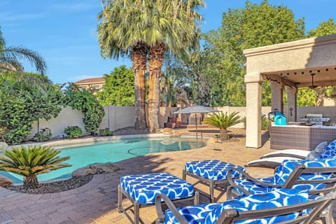 Spacious backyard with Pool (not heated), outdoor dining and lounge chairs