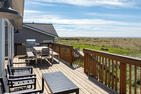 Step onto your private deck and breathe in the fresh coastal air while enjoying panoramic views of endless grasslands stretching to the horizon.